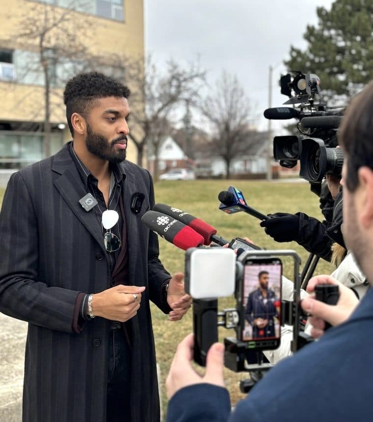 Tony speaking to reporters